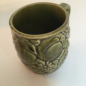 Vintage ceramic mug marked Japan embossed flowers and fruits green glaze